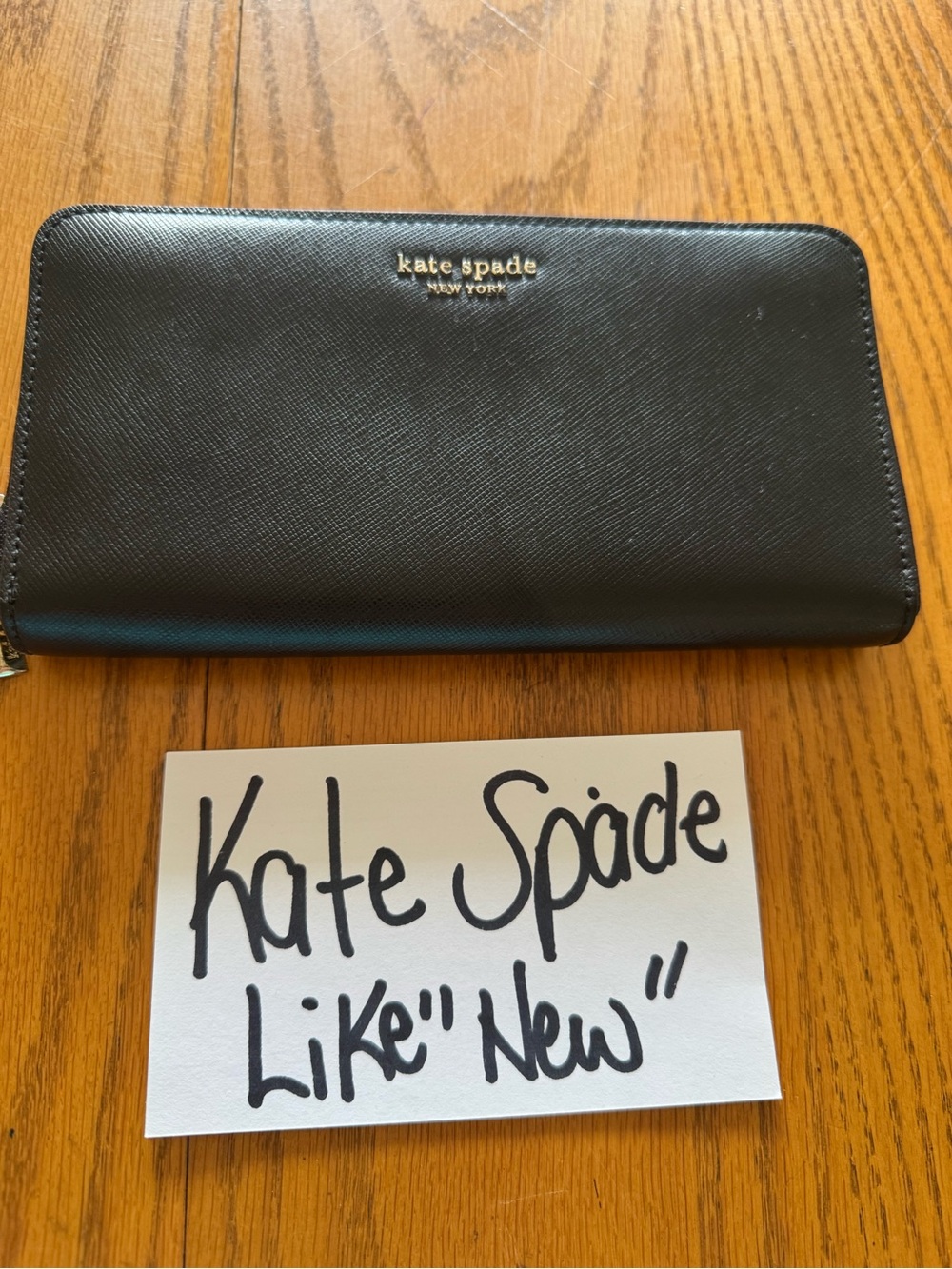 kate spade Black Saffiano Zip-Around Wallet with Gold Logo